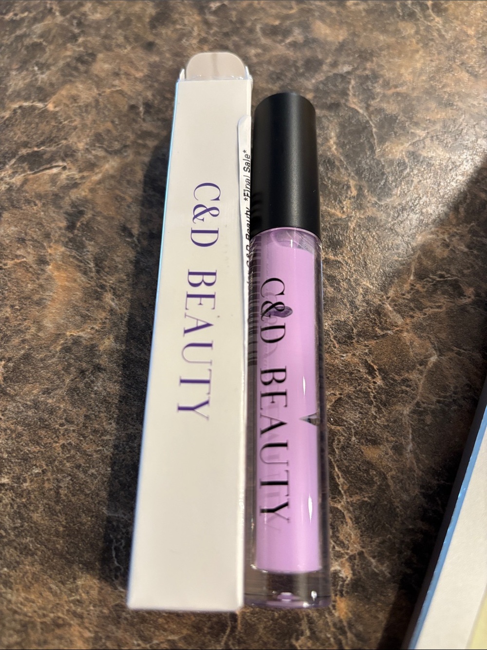 C&D Lavender Blur Concealer.